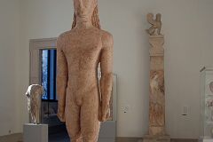 Met Highlights 07-3 Greek Marble statue of a kouros youth, Marble stele (grave marker) of a youth and little girl with capital and finial in the form of a sphinx